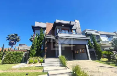 Casa mobiliada com piscina e 4 vagas no alphaville em gravataí