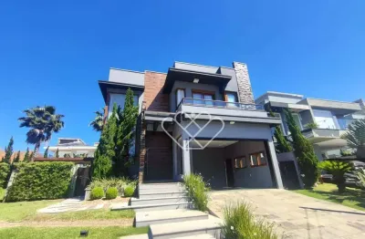 Casa mobiliada com piscina e 4 vagas no Alphaville em Gravataí