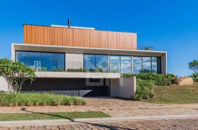 Residência exclusiva no bairro dom feliciano com arquitetura contemporânea e ampla área privativa