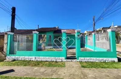 Casa no centro de Gravataí com excelente área construída e localização estratégica para morar ou investir
