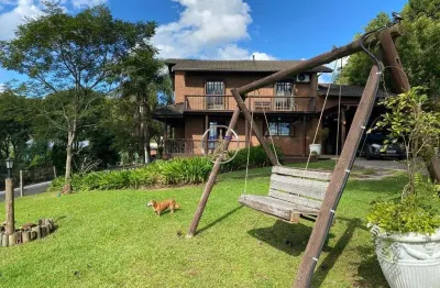 Casa com 4 quartos à venda em vale dos pinheiros, gramado  por r$ 1.150.000