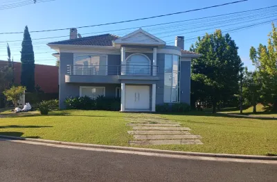 Luxo no alphaville graciosa: 5 suítes, piscina aquecida e terreno de 903m²