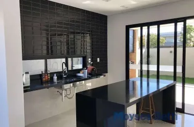 Casa térrea de  no condomínio giverny, próximo ao shopping iguatemi