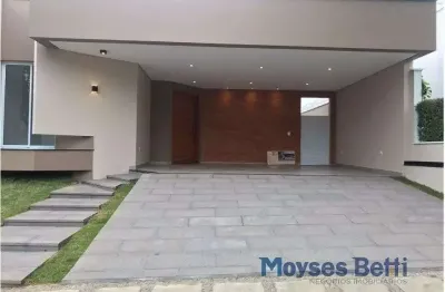 Casa térrea com 3 suítes, escritório, 4 vagas, área gourmet.