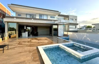 Duplex com  657 m2 construídos, 4 suítes, 3 closets, hidro, área gourmet e piscina no arquipélago de manguinhos