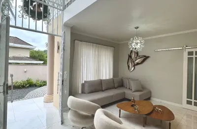 Belíssima casa à venda em condomínio fechado no bairro glória - 4 suítes - joinville/sc.