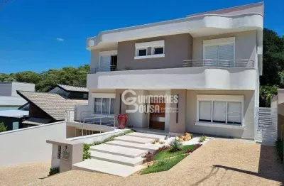 Casa de 4 suítes no condomínio terras de vinhedo – piscina aquecida, área gourmet e privacidade