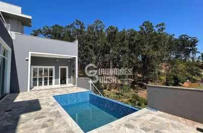 Sobrado á venda no terras de santa teresa - 4 suítes, piscina infinita e vista deslumbrante