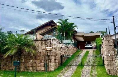 Casa térrea à venda no condomínio marambaia  vinhedo/sp | 3 suítes, piscina, sauna e vista livre!