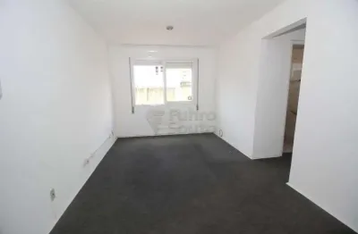 Aluga-se apartamento de 2 dormitórios no edifício residencial comodoro - conforto e praticidade no centro de pelotas