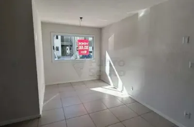 Apartamento térreo no condomínio coimbra  de 2 dormitórios.