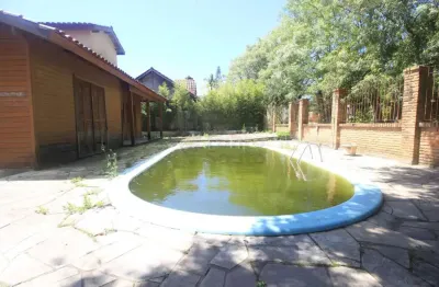 Casa com 3 quartos para alugar na Rua General José Artigas, 118935462, Laranjal, Pelotas