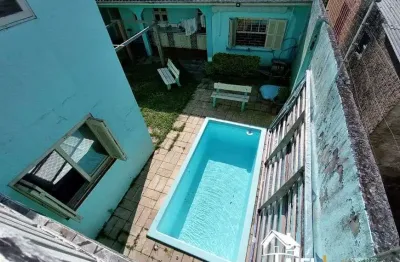 Casa com piscina, sala de jogos, anexo gourmet na praia de cidreira/rs