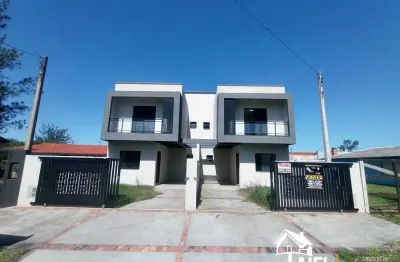 Excelente sobrado geminado apto ao financiamento bancário na praia de cidreira/rs