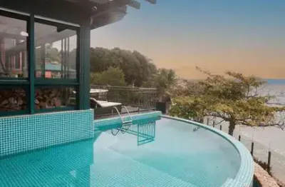Casa com 5 quartos à venda no Cacupé, Florianópolis 