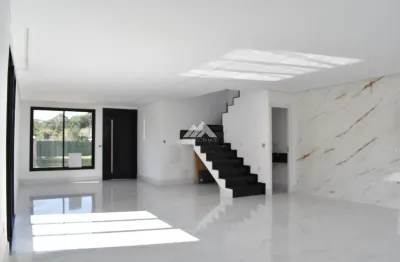 Casa nova com 3 suítes 2 vagas quintal e terraço em condomínio clube á venda