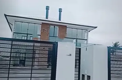 Desfrute da tranquilidade e beleza da praia da pinheira no residencial bruggmann!