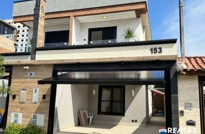 Casa com 3 dormitórios à venda por r$ 950.000,00 - maracanã - praia grande/sp