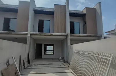 Sobrado geminado a venda no bairro costa e silva com suíte e 2 vagas.