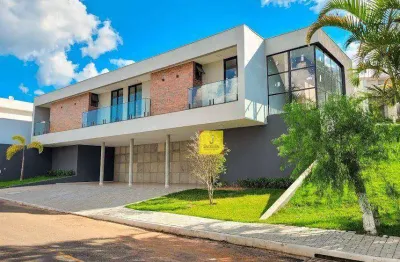 Maravilhosa casa com 4 suítes, 4 vagas e área de lazer no spina ville