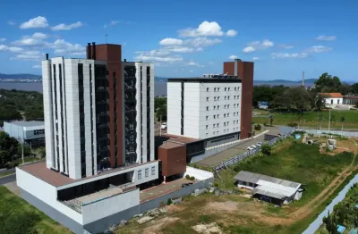 Terreno em condomínio fechado à venda na Rua Dos Pardais, 360, Coronel Nassuca, Guaíba