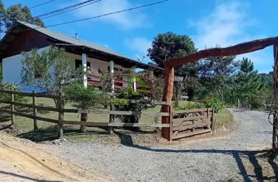 Chácara à venda em anitápolis-sc: casa rústica com 1 quarto, 2 salas e vista deslumbrante!
