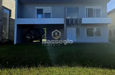 Casa no condomínio golden river em imbé com 4 suíte