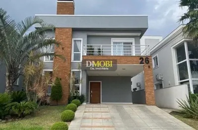 Sobrado com 3 dormitórios para alugar, 250 m² por r$ 17.080,00/mês - alphaville - gravataí/rs