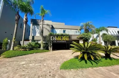 Sobrado com 3 dormitórios para alugar, 393 m² por r$ 25.428,52/mês - alphaville - gravataí/rs