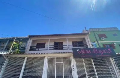 Sobrado com 3 dormitórios à venda, 180 m² por R$ 1.300.000,00 - Jardim Do Bosque - Cachoeirinha/RS