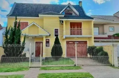 Sobrado com 4 dormitórios, 350 m² - venda por R$ 1.100.000,00 - Dom Feliciano - Gravataí/RS