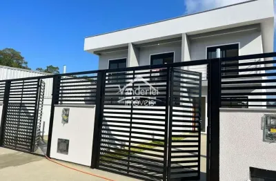 Sobrado no loteamento shutz com 02 quartos, sendo 01 suíte no bairro aririu em palhoça - sc