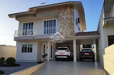 Casa de alto padrão com 03 quartos, sendo 01 suíte no centro em palhoça - sc