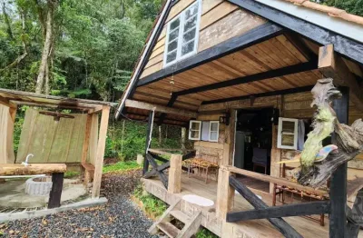 Vendo sitio em condomínio com 2 chalés rústicos em doutor pedrinho