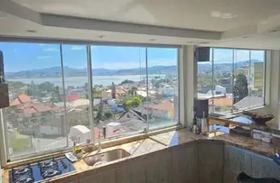 Vista belíssima com por do sol! cobertura à venda no abraão com 4 dorm.