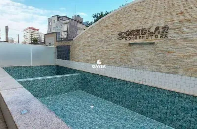 Apartamento de 2 dormitórios com sacada na aviação em praia grande