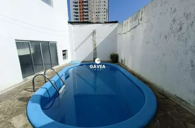 Sobrado triplex para locação na vila valença em são vicente.