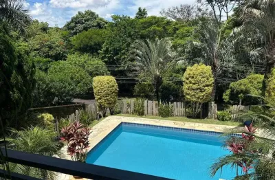 Casa no condomínio jardim botânico (sousas) com 456 m², 3 suítes e piscina.