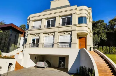 Casa em condomínio fechado com 4 quartos à venda na Estrada Haroldo Soares Glavan, 4690, Cacupé, Florianópolis