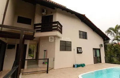 Casa em condomínio fechado com 6 quartos à venda na Estrada Haroldo Soares Glavan, 1950, Cacupé, Florianópolis