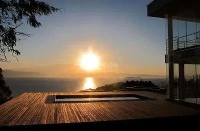 Casa em condomínio fechado com 3 quartos à venda na Estrada Haroldo Soares Glavan, 4430, Cacupé, Florianópolis