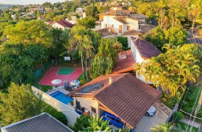 Re/max vende casa no condomínio jardim botânico, 3 suítes (sendo uma térrea), com 362m2, por r$ 2.480.000,00 – sousas, campinas.