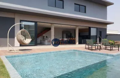 Casa no condomínio pau brasil com piscina em americana