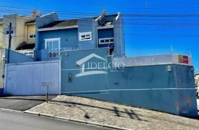 Casa com 3 quartos à venda na rua gabirobas, 32, uberaba, curitiba por r$ 1.090.000