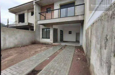 Sobrado com 3 dormitórios à venda, 132 m² por R$ 920.000,00 - Centro - Guaratuba/PR