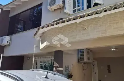 Casa em condomínio fechado com 3 quartos à venda na Rua dos Guaranis, 97, Espírito Santo, Porto Alegre