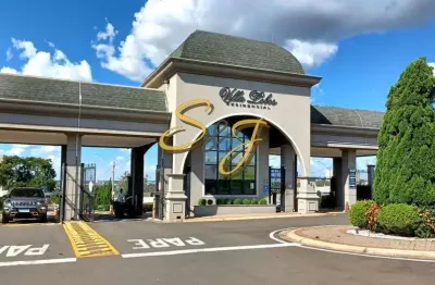 Terreno a venda no bairro parque brasil 500, condomínio villa lobos, paulínia/sp