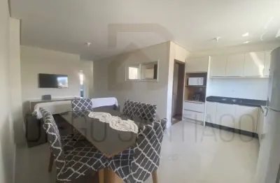 Apartamento de 2 quartos com 1 suíte, 2 salas e vaga de garagem em garopaba-sc: oportunidade de investimento!
