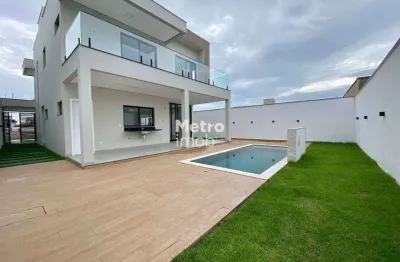 Casa de condomínio sobrado para venda tem 303 metros quadrados com 4 quartos