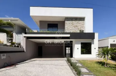 Maravilhoso sobrado moderno com piscina aquecida e acabamento de alto padrão.